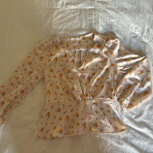 Lush Floral Peplum Top